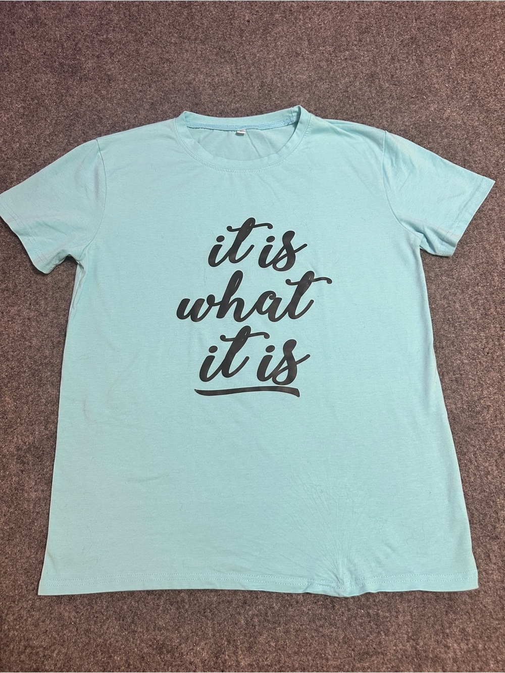 This is a light blue short-sleeve graphic t-shirt